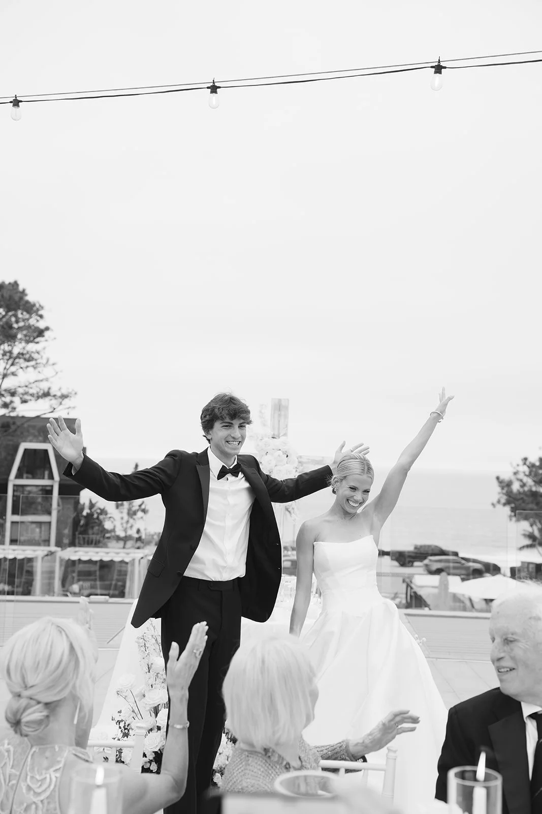 The Bride and Groom walking into the reception