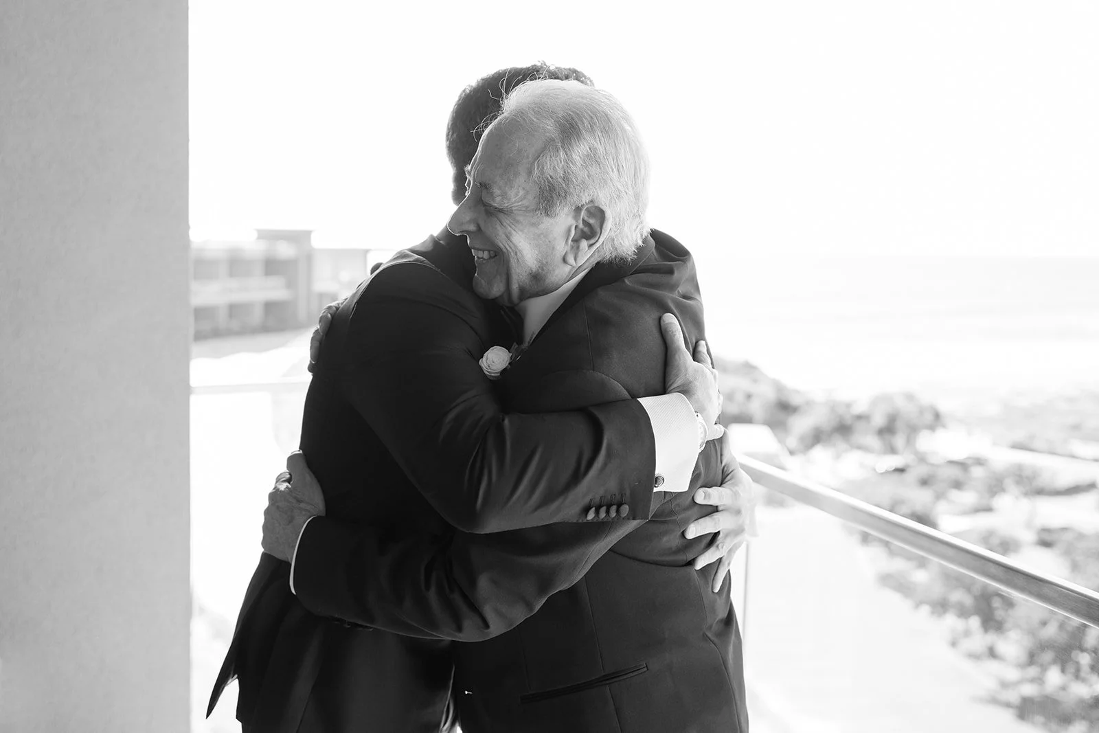 father son hug wedding day candid photos editorial luxury