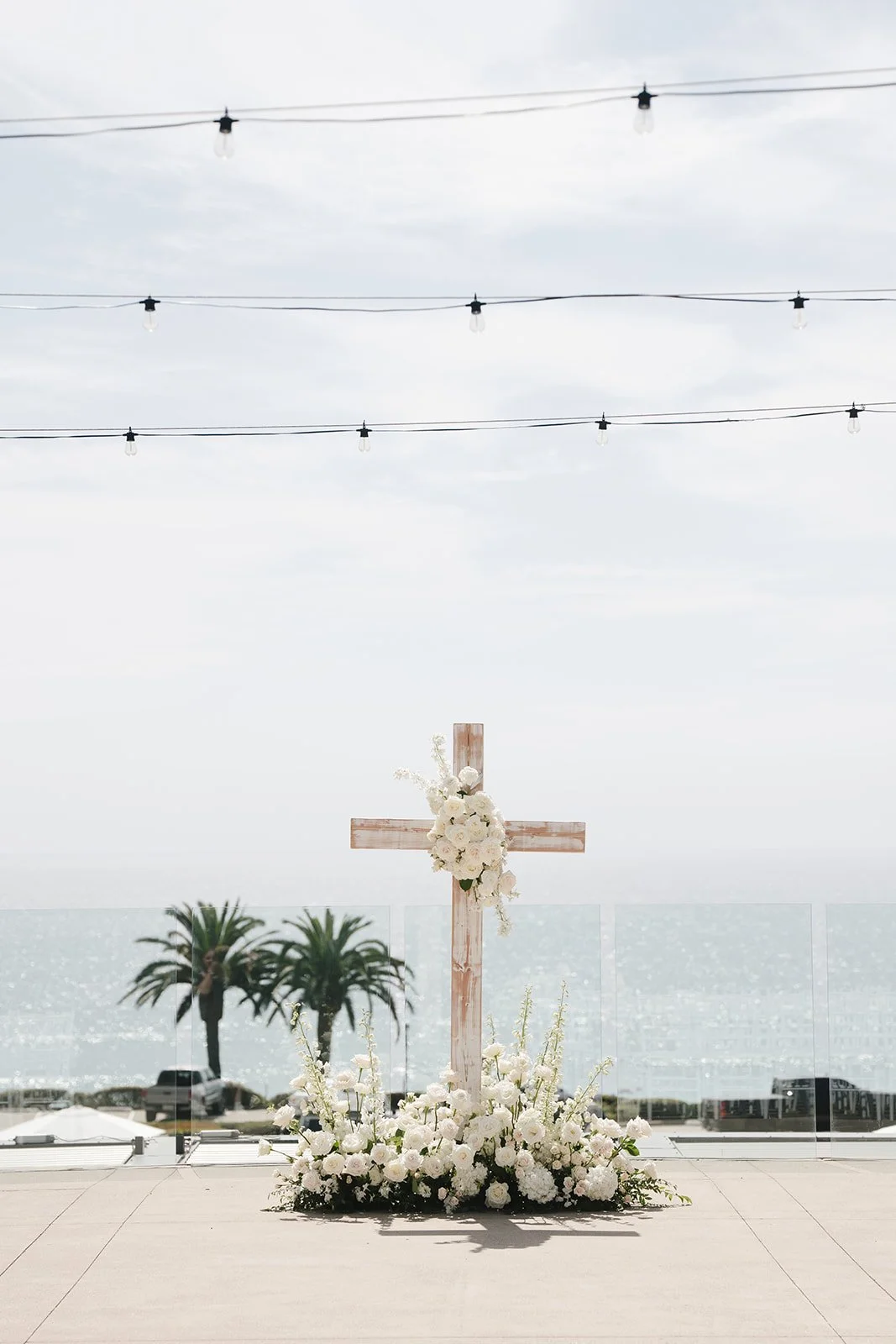 A cross with a flower arrangement