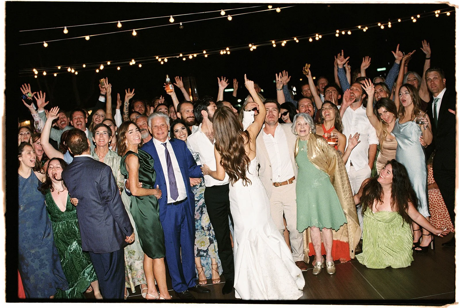  Candid moments after the group photo. 35 mm film. 