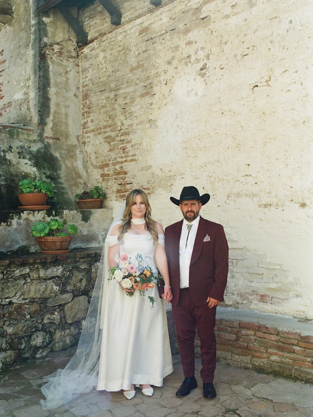 The bride and groom posed for a portrait