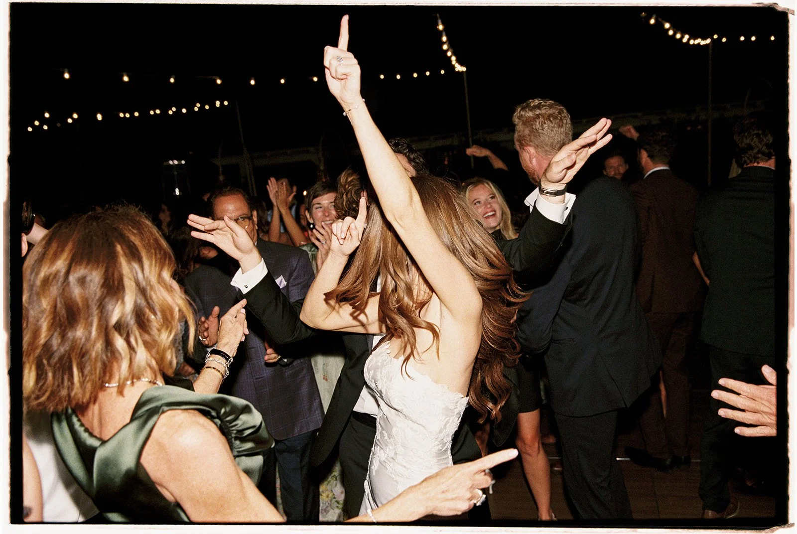  Candid moments, dancing the night away. 35 mm film. 