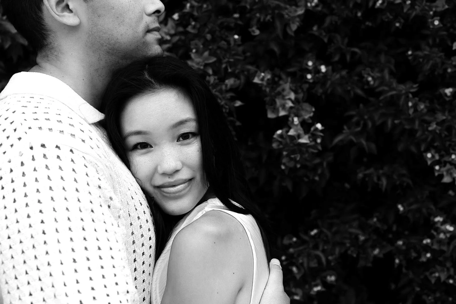 black and white photo of a couple during their destination engagement photoshoot on the Mediterranean coast on the South of France near Nice