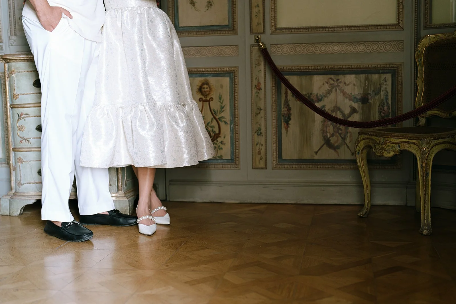 The soon to be bride and groom in the Monkey Fair Room of the Villa Ephrussi during their destination engagement session on the South of France