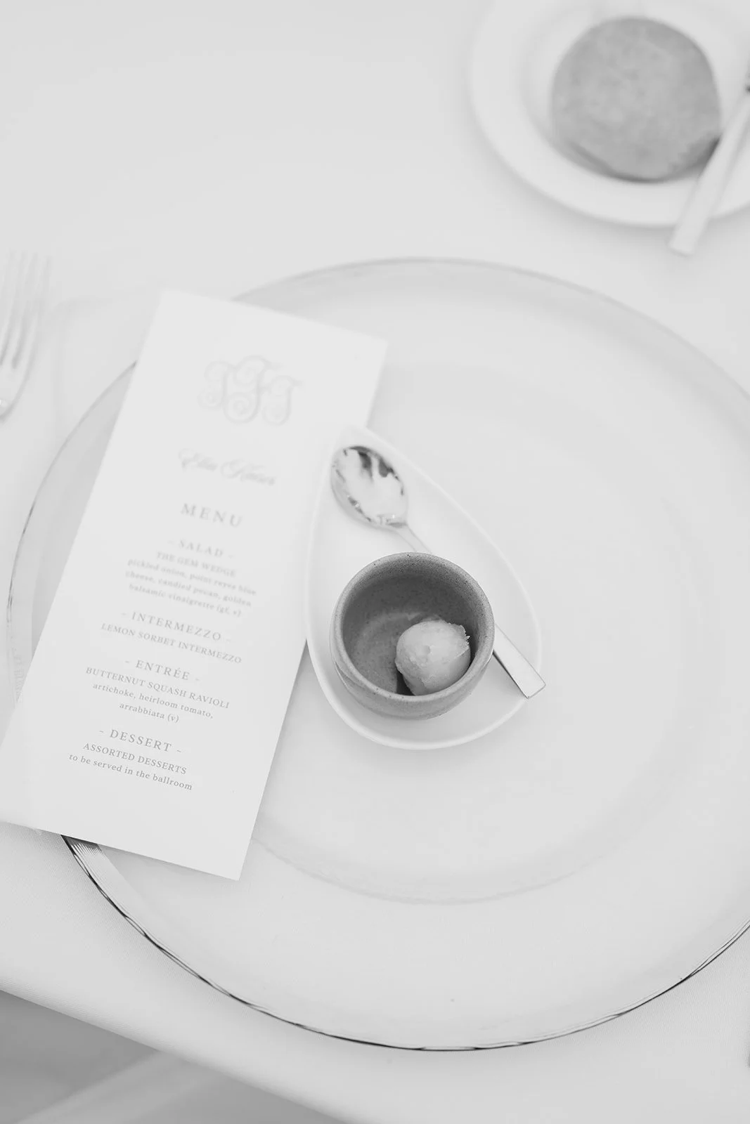 Close-up of lemon sorbet and a dinner menu.