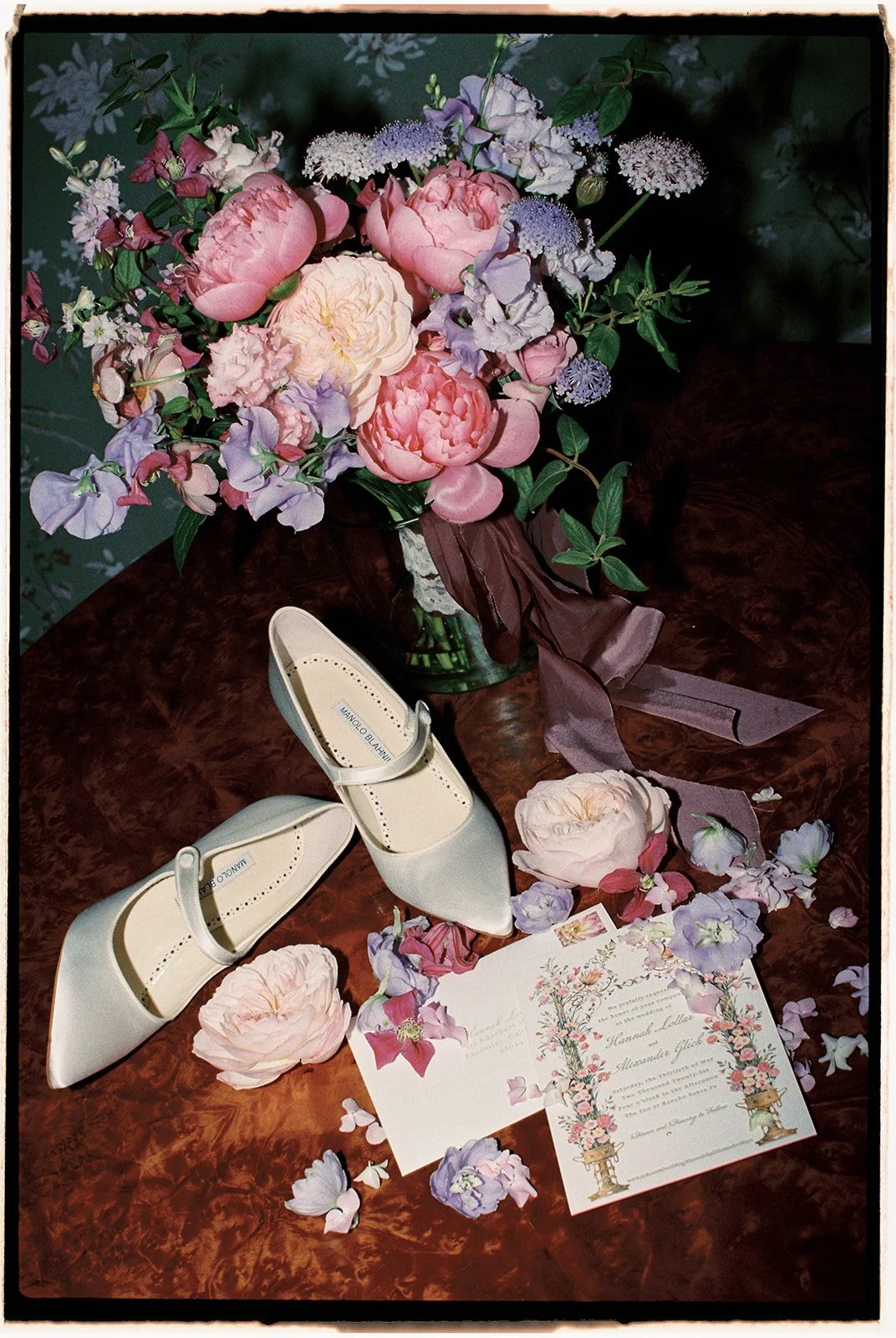  The details: the   Manolo Blahnik   bridal shoes, the vibrant bridal bouquet arranged by   Esprit Floral Co.  , and the wedding invitation suite.  