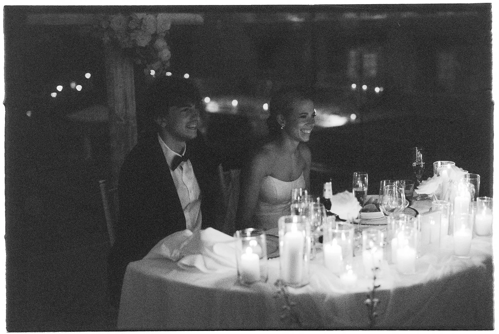 The Bride and Groom smiling.