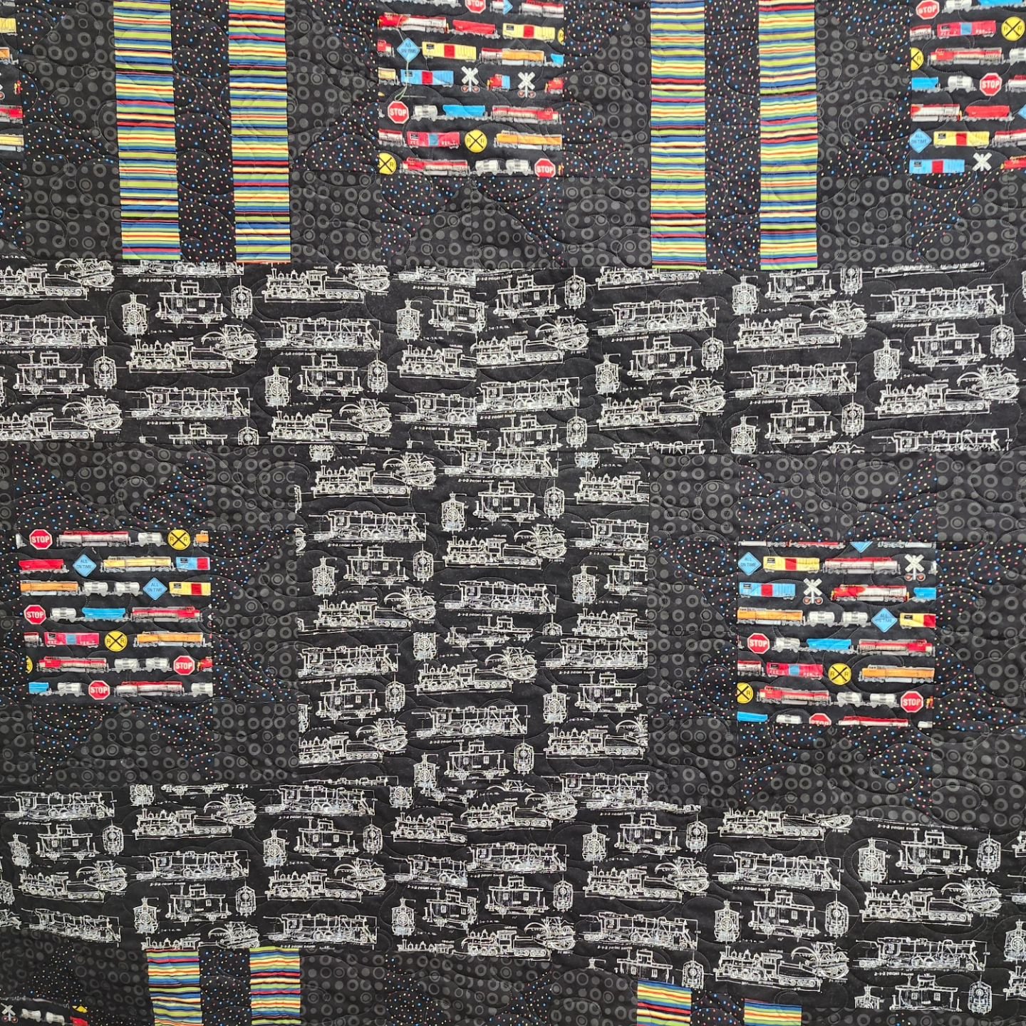 Linda was in today to longarm this great train quilt. She chose a pattern called 'oriental clouds', which simulates smoke.  The back also has some wonderful train panels  #longarmmachinerentals ##quiltfun ##quiltyourselfawesome ##quilting ##gammillst
