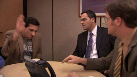 A gif of the character Michael Scott in the series The Office shouting "Thank you" in a business meeting.