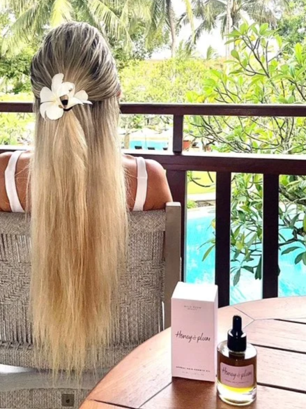 Honey & Plum Hair Growth Oil made with natural botanicals to support healthy hair growth, scalp hydration and reduced breakage