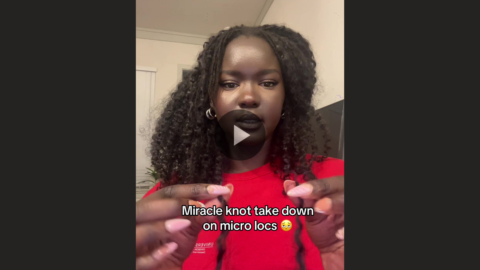 woman taking down miracle knots on microlocs safely