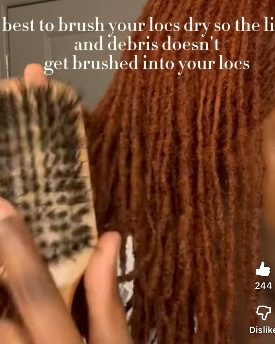 woman managing lint in microlocs