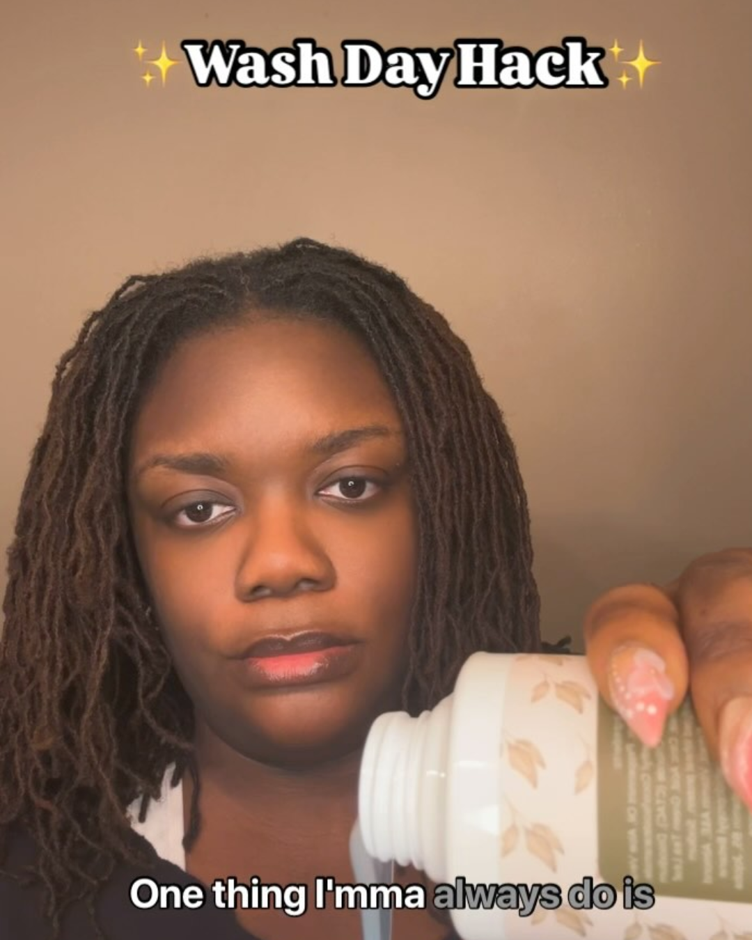  woman shampooing microlocs 