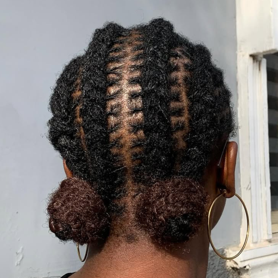 woman with microlocs cornrows