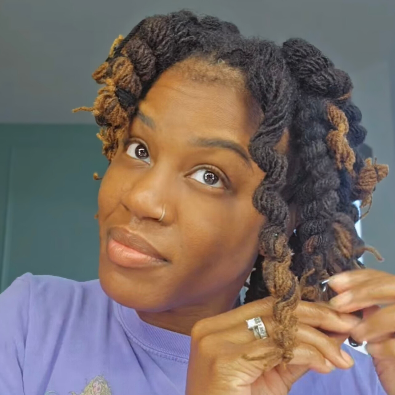 woman with microlocs and rope curls