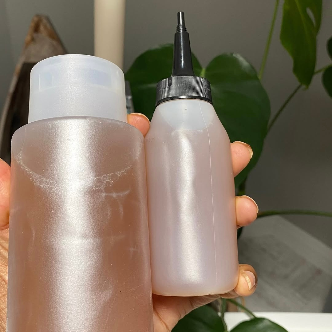 woman with microlocs and residue-free shampoo detox