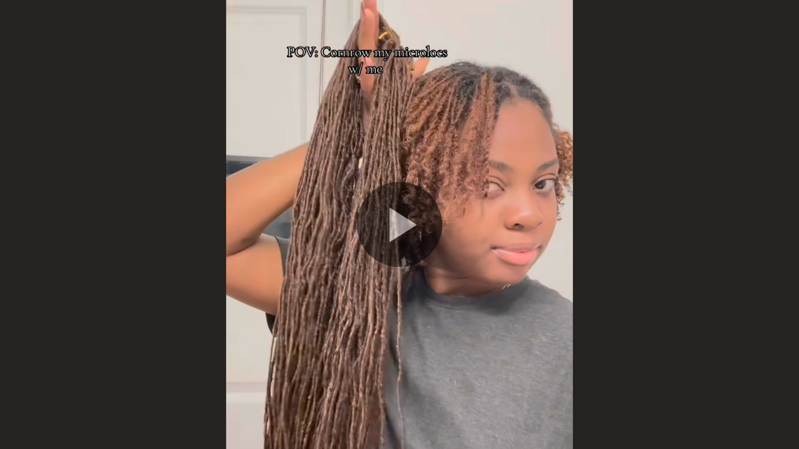 woman with microlocs and cornrow extensions