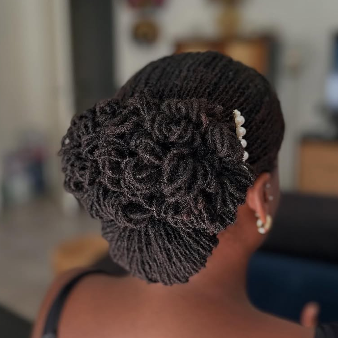 woman with microlocs bun