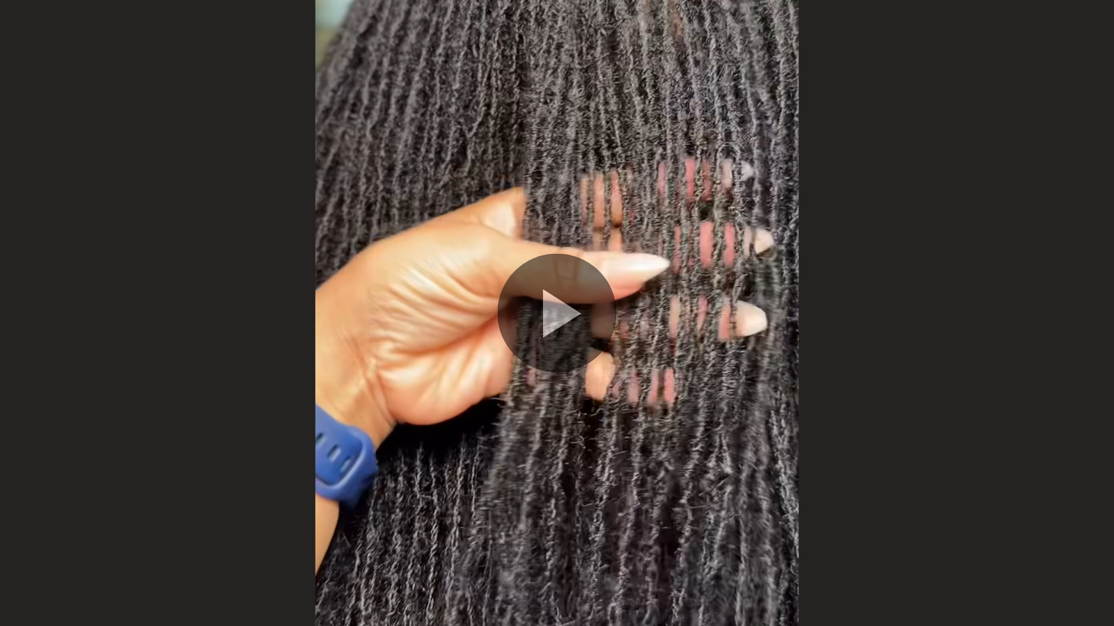 woman with microlocs and crochet extensions