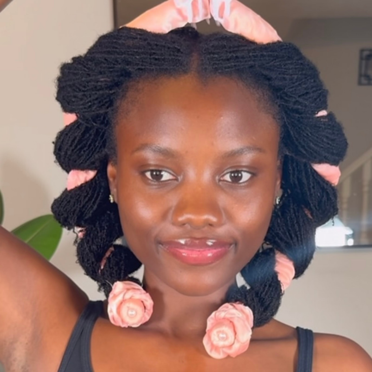 woman with microlocs and curl headband