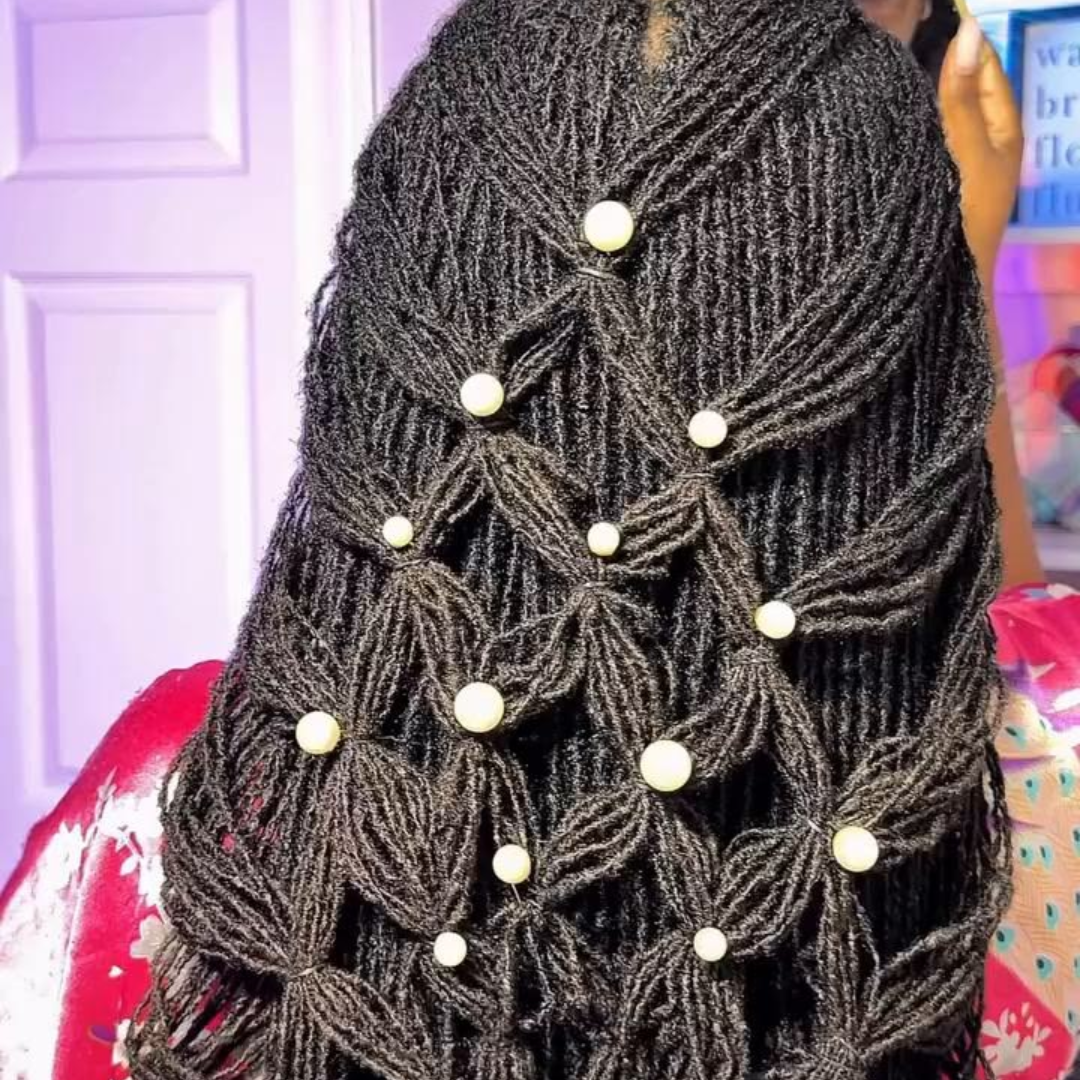 woman with tapestry hairstyle on long microlocs