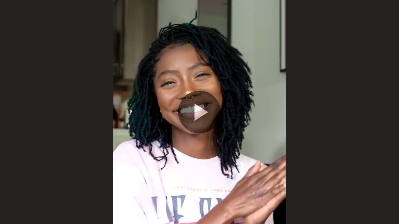 woman with microlcs and boho halo braids crown