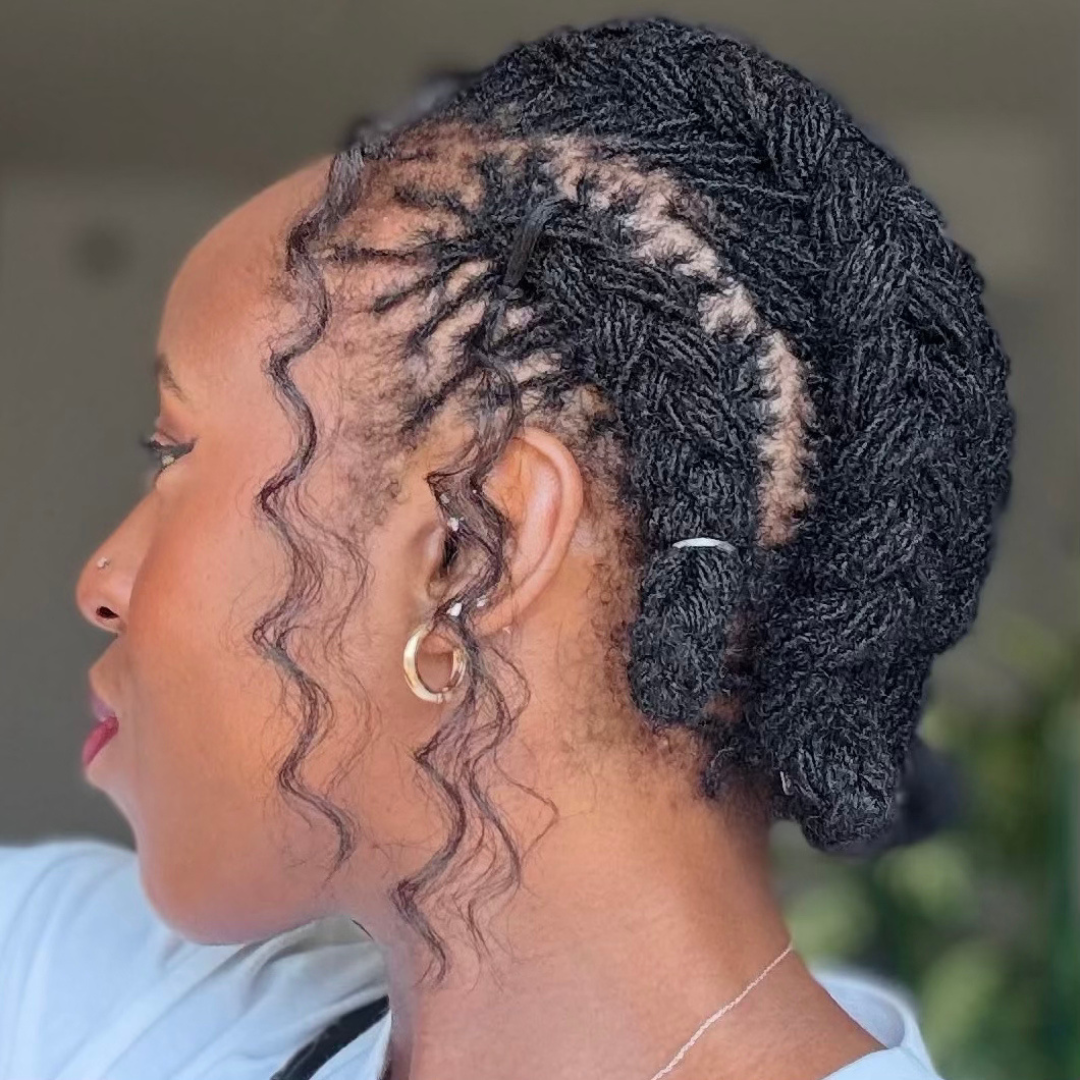 woman with microlocs and boho cornrow braids