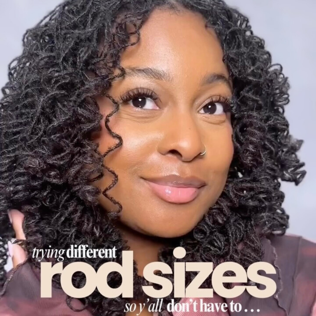 woman with microlocs and perm rod curls