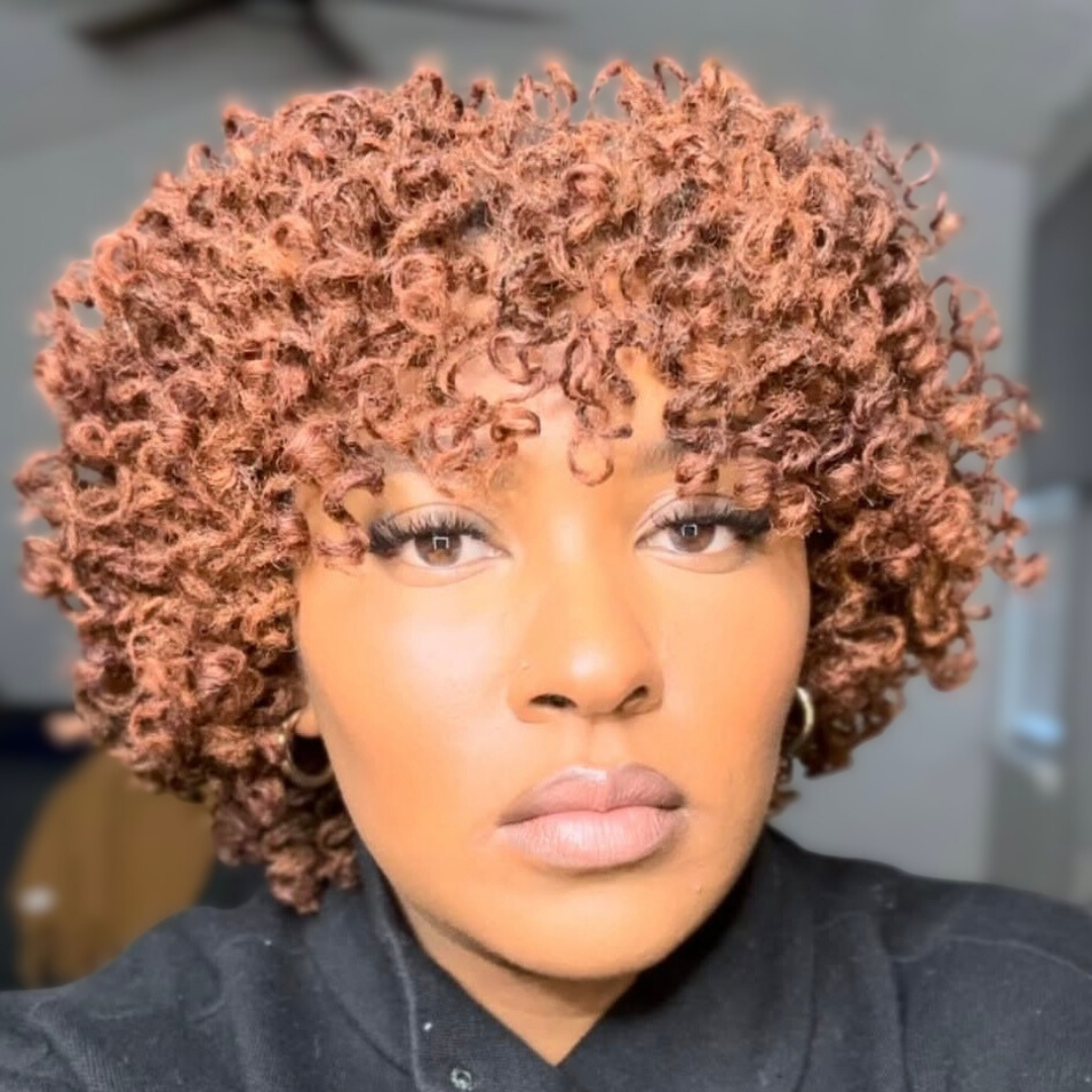 woman with microlocs and perm rod curls