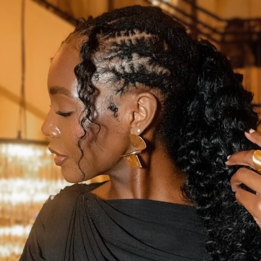woman with microlocs and curly ponytail extension