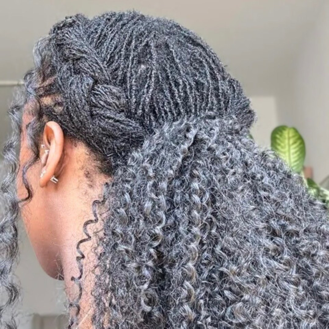woman with microlocs and ponytail extension
