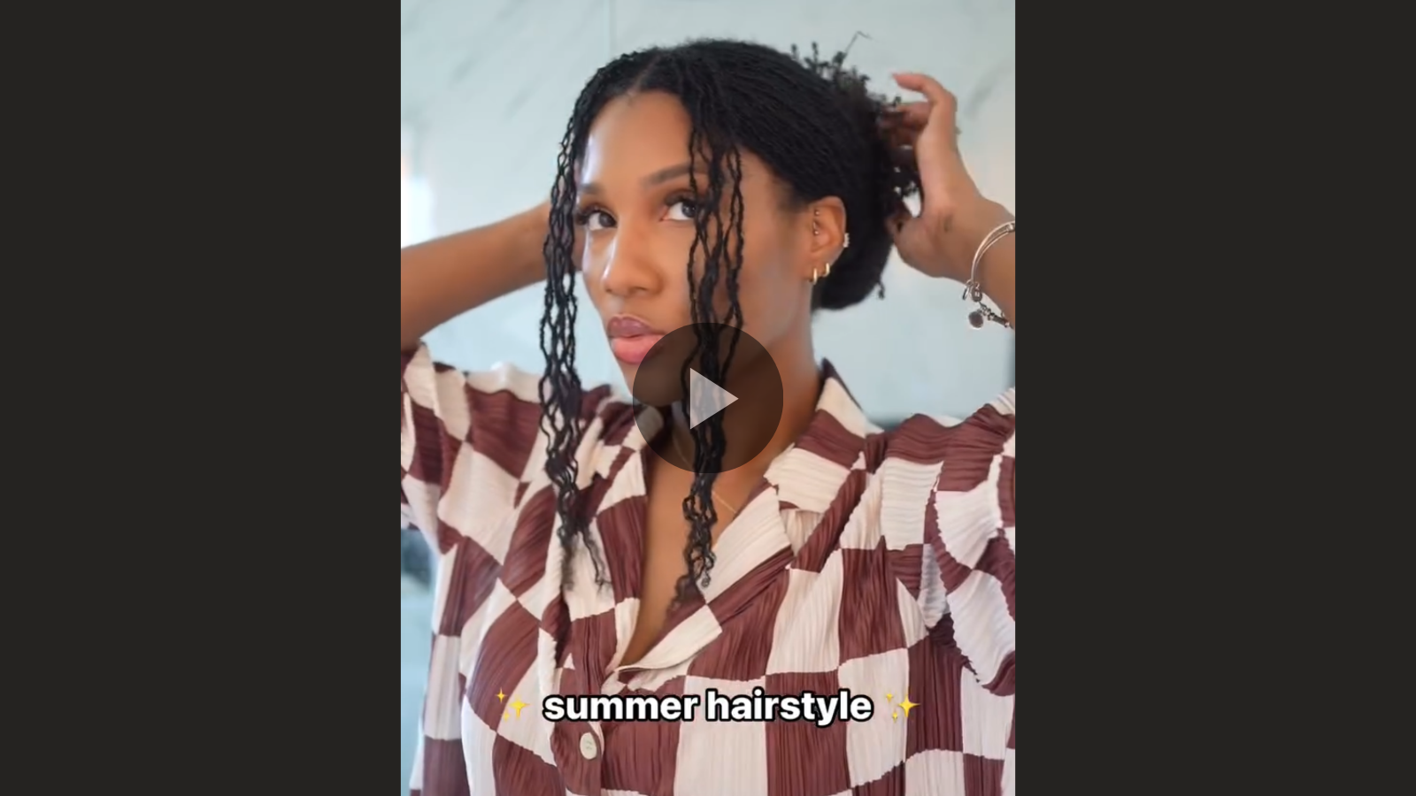 woman with microlocs and updo bangs with bangs