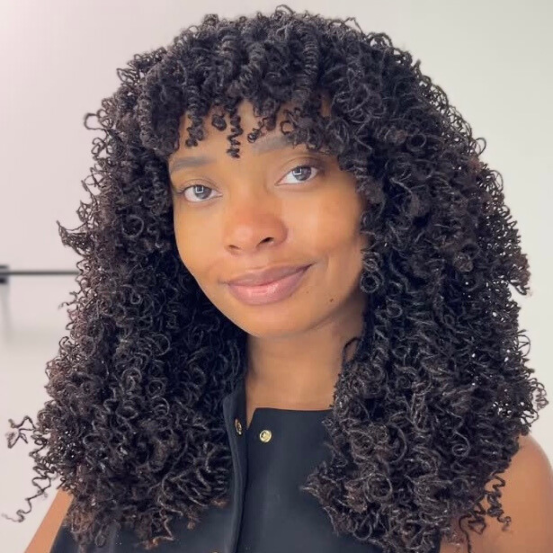 woman with microlocs and pipe cleaner curls