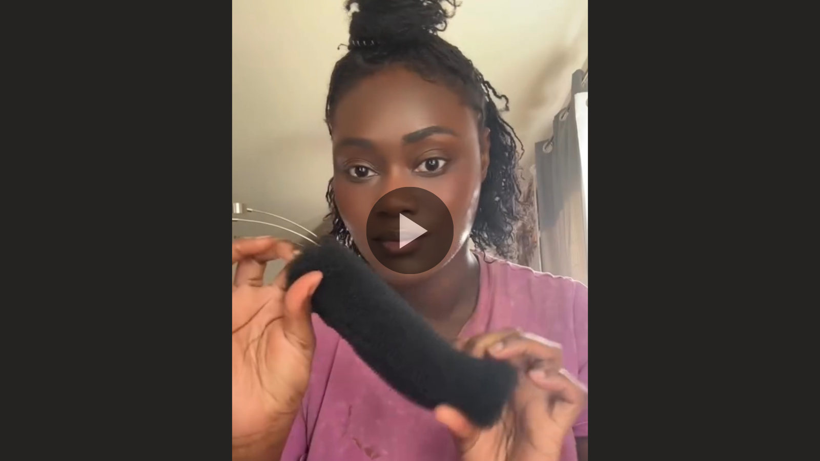 woman with microlocs and embellished top bun updo