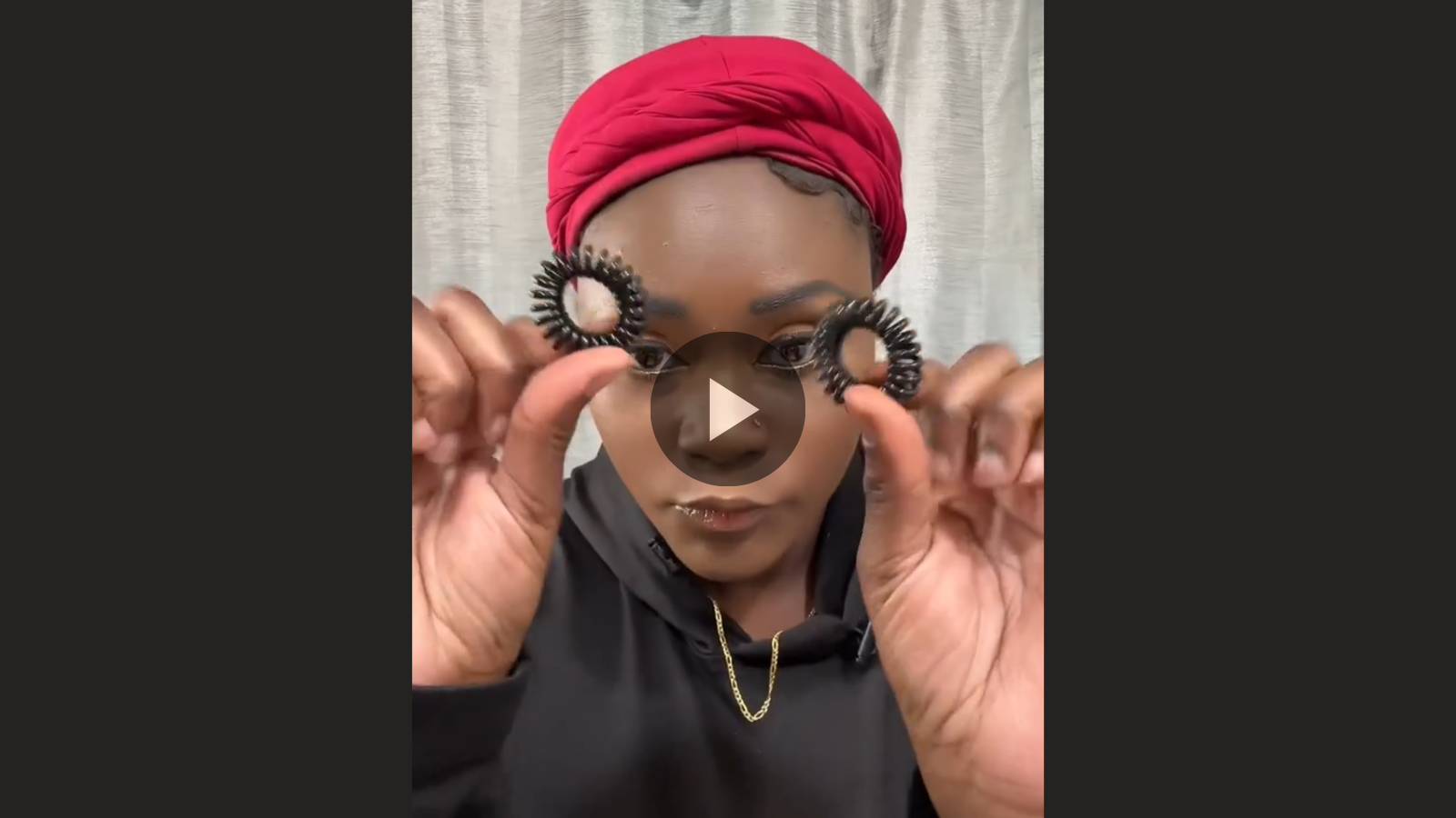 woman with microlocs and petal braid updo