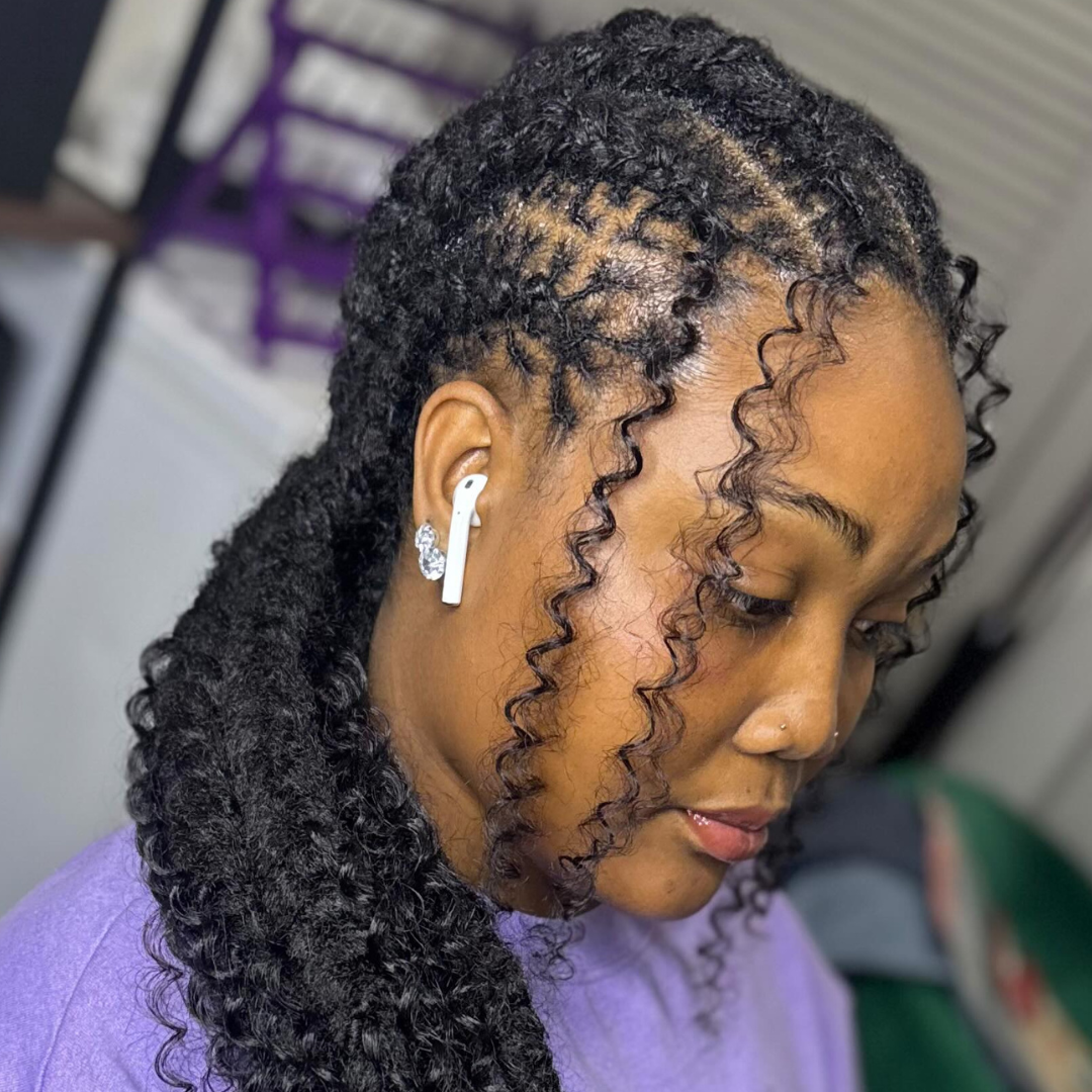 woman with microlocs cornrows with extensions