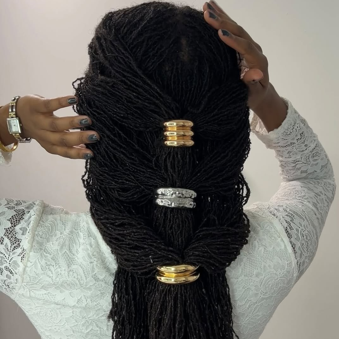 woman with tapestry hairstyle on long microlocs