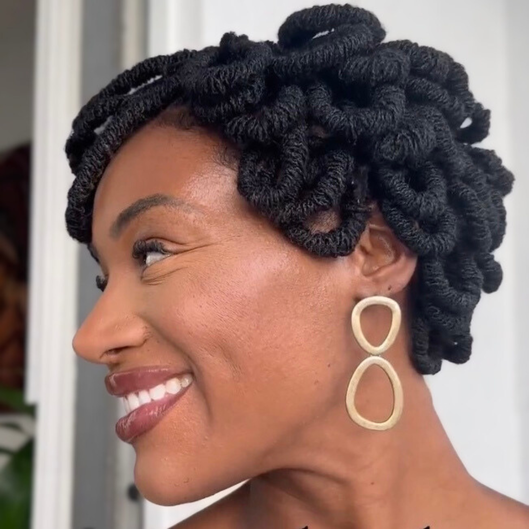 woman with microlocs and pipe cleaner curls