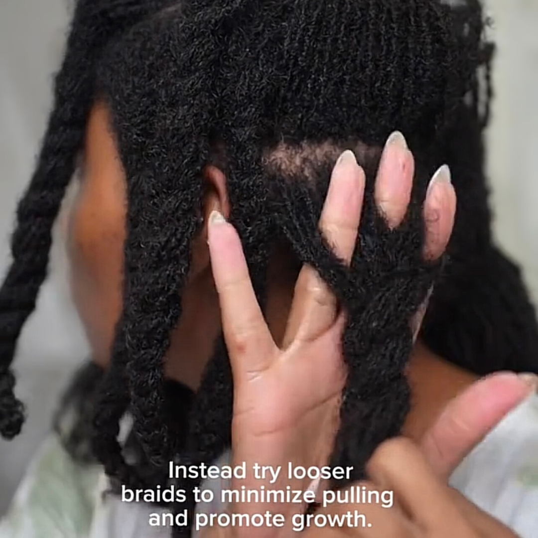 woman with microlocs and loose braids