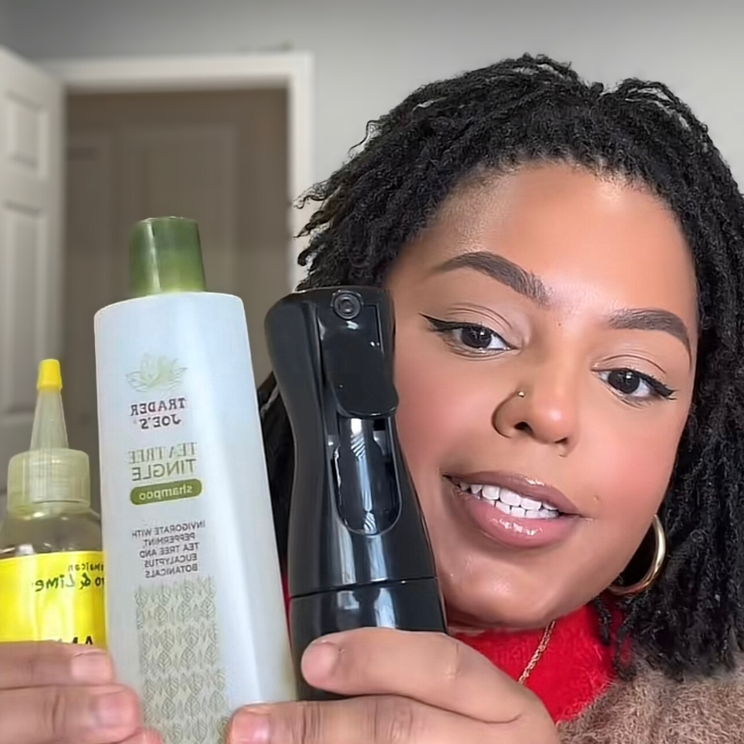 woman with microlocs and maintenance and moisture products