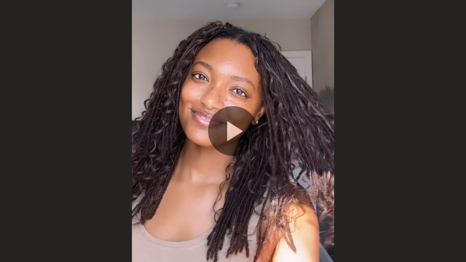 woman with microlocs and boho extensions