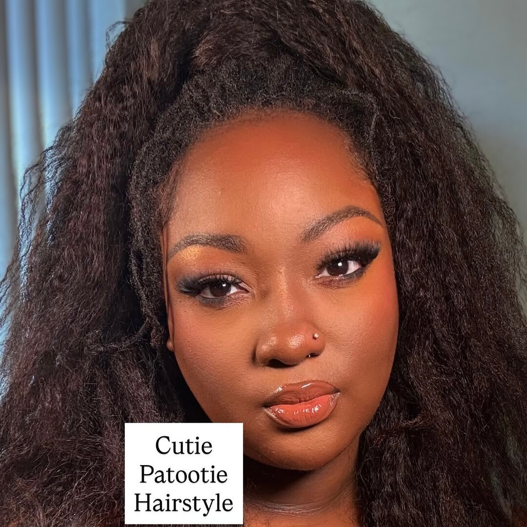 woman with microlocs and clip in extensions