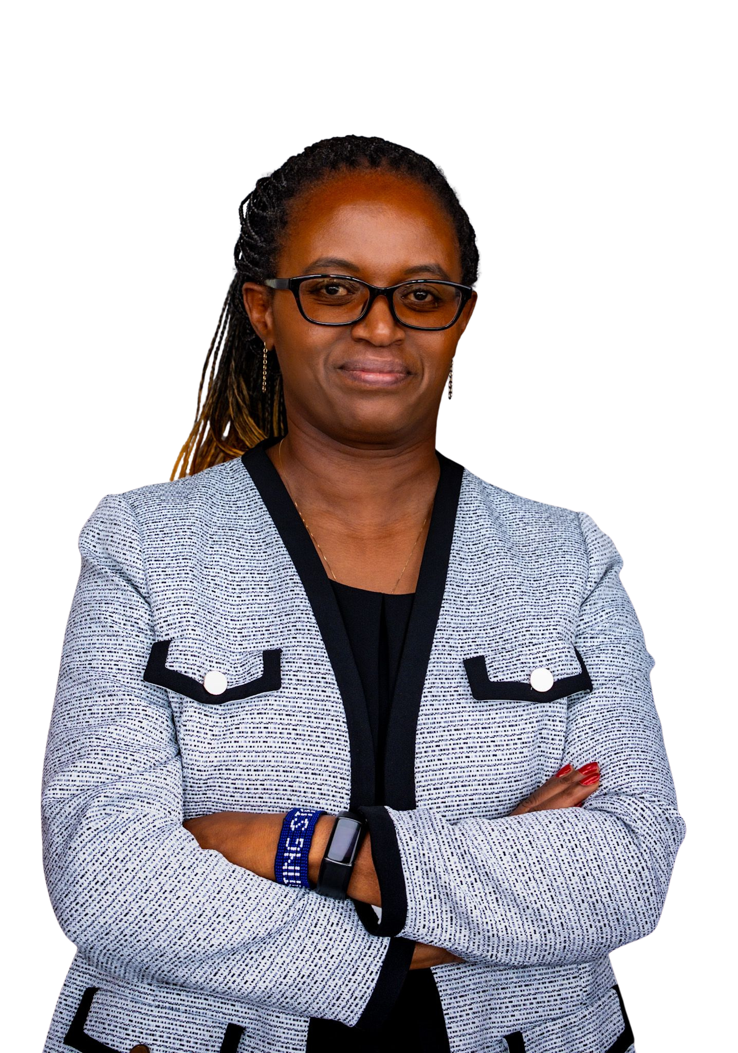 A confident African American woman with glasses and earrings, wearing a light gray blazer with black trim and crossed arms, standing against a black background.