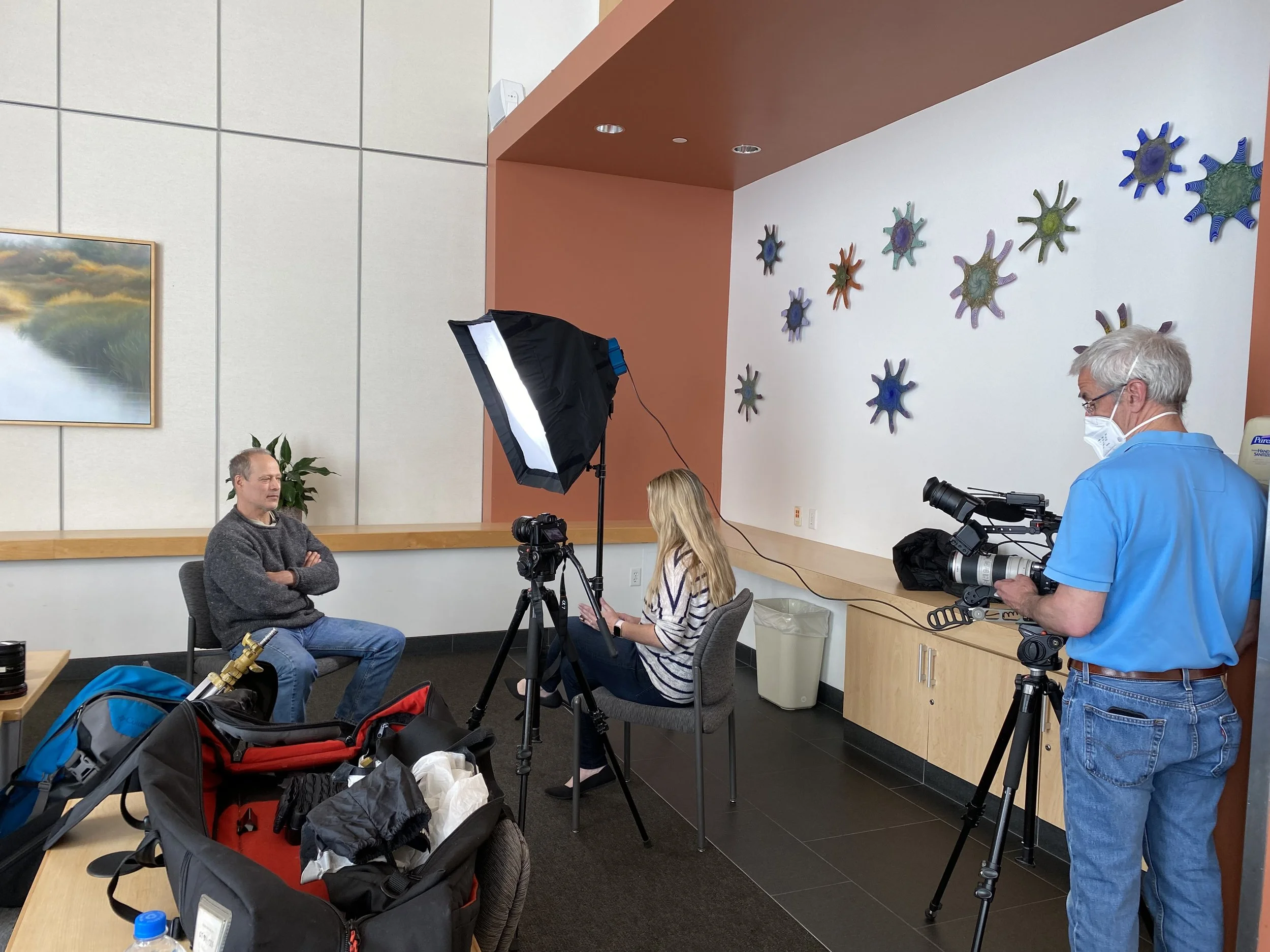 Martha Shade, Sebastian Junger, and photojournalist Bob Crowley.