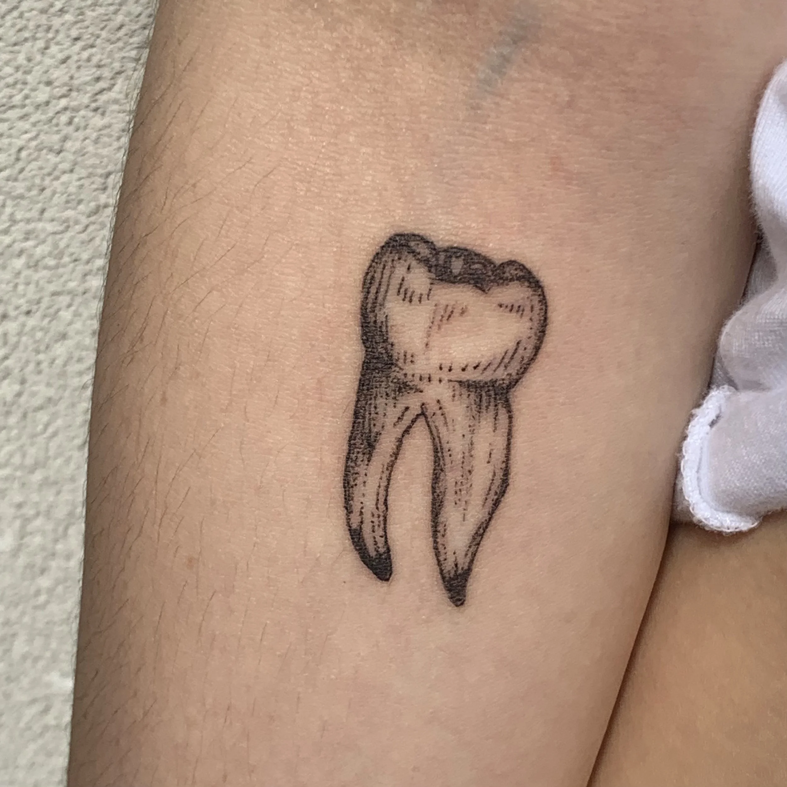 Toof tattoo.jpg