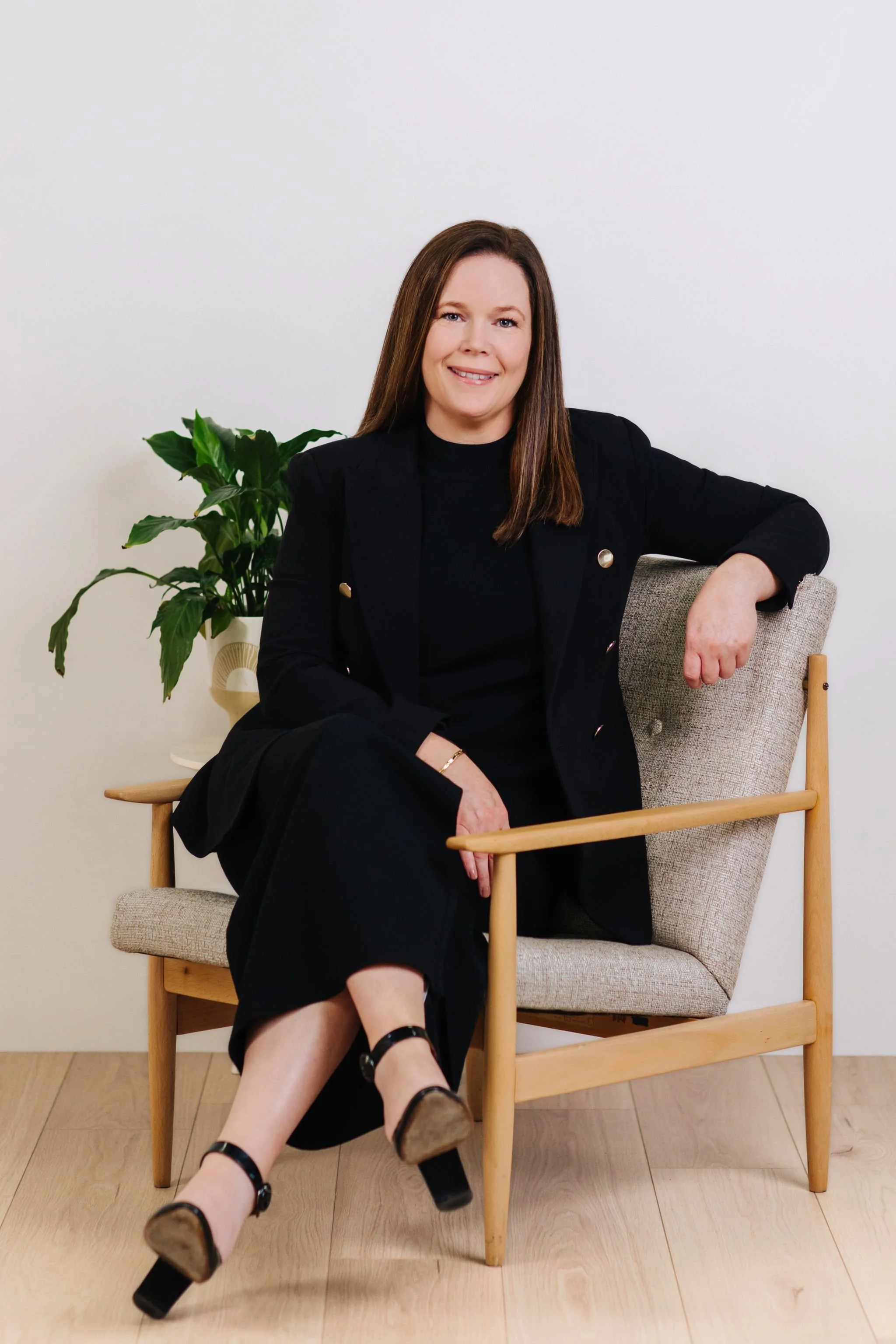 Seated Portrait of Rachel Peattie – Partner, Arkadia Family Law