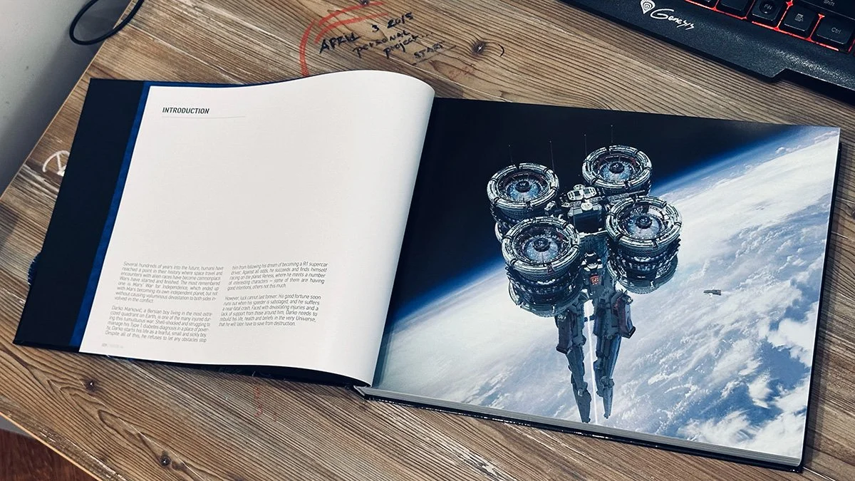 An open book showing a spaceship in space with Earth in the background, placed on a wooden desk.