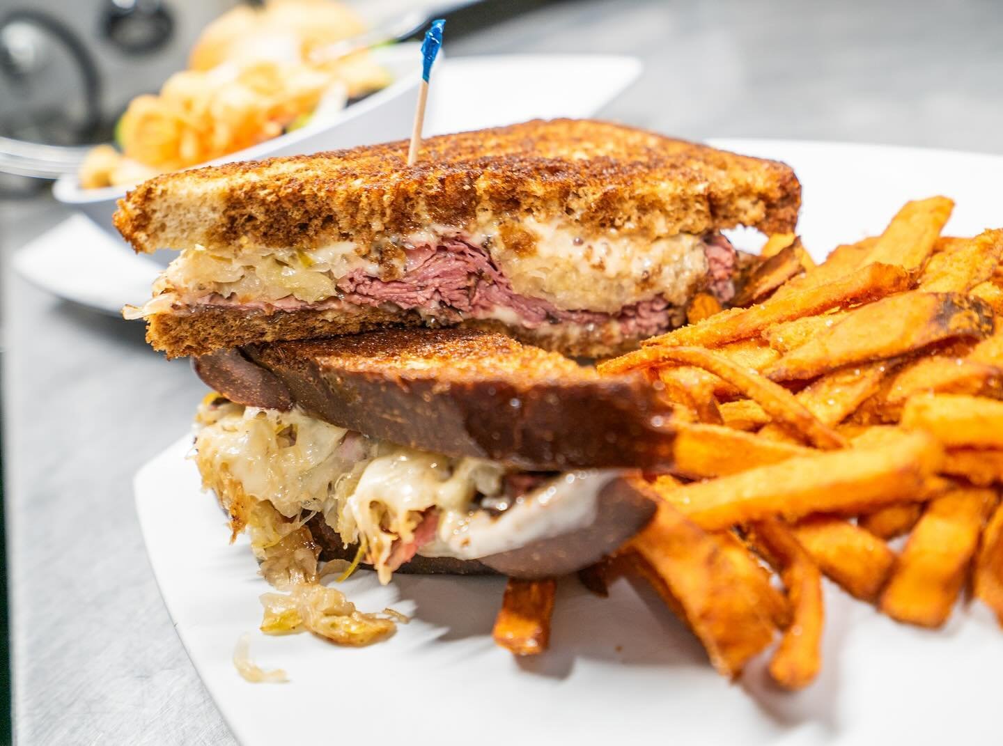 Come try our Rueben Sandwich! Sliced pastrami, sauerkraut and Swiss on marble rye with stone ground mustard aioli 🍻