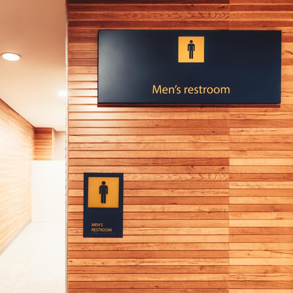 Cohesive #Signage Systems with ADA Code-Compliant Restroom Identifier and Matching Overhead #Wayfinding Asset

#signs #publicsigns #braille