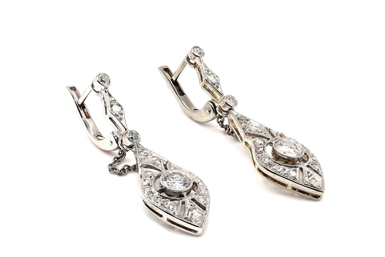 Deco earrings at angle resize for website.jpg